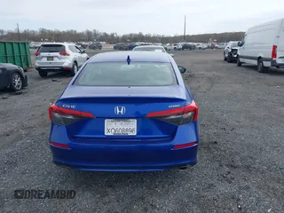2022 Honda Civic Sport z VIN 2HGFE2F50NH503994, wystawiony jako IAAI lot #41870938 z przebiegiem 26 666 mil mil oraz . Historia ofert i sprzedaży dostępna na DreamBid. Obrazek 16.