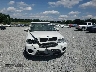 2013 BMW X5 xDrive35i z VIN 5UXZV4C52D0G56473, wystawiony jako Copart lot #56563345 z przebiegiem 156 884 mil mil oraz Szkoda całkowita • Salvage title. Historia ofert i sprzedaży dostępna na DreamBid. Obrazek 14.