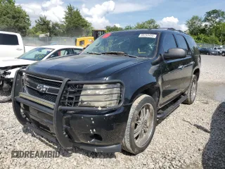 2009 Chevrolet Tahoe LS with VIN 1GNFC13C79R136641, listed as a Copart auction lot 60283455 with 128,110 mi miles and Salvage title. Bid and sale history available at DreamBid. Image 1.