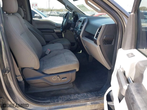 2015 Ford F-150 XLT w/HD Payload Pkg with VIN 1FTFW1EF7FKD04869, listed as a IAAI auction lot 41664736 with 165,784 mi miles. Bid and sale history available at carsss.com. Image 5.