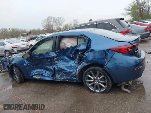 2018 Mazda 3 Touring with VIN 3MZBN1V35JM217641, listed as a IAAI auction lot 41943433 with 64,884 mi miles. Bid and sale history available at carsss.com. Image 6.
