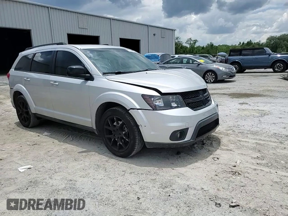 2013 Dodge Journey SXT with VIN 3C4PDCBG4DT685370, listed as a Copart auction lot 61353335 with 193,973 mi miles and Salvage title. Bid and sale history available at DreamBid. Image 14.