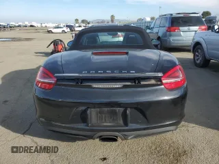 2014 Porsche Boxster with VIN WP0CA2A84ES121667, listed as a Copart auction lot 87510945 with 62,689 mi miles and Salvage title. Bid and sale history available at DreamBid. Image 6.