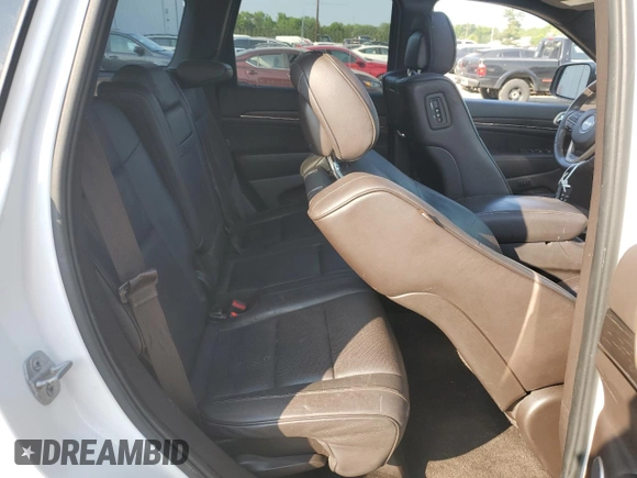 2014 Jeep Grand Cherokee Summit с VIN 1C4RJEJGXEC449558, выставлен на аукционе Copart как лот 59346845 с пробегом Не указан миль и Списание • Salvage title. История ставок и продаж доступна на DreamBid. Изображение 11.