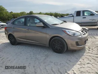2014 Hyundai Accent GLS z VIN KMHCT4AEXEU680071, wystawiony jako Copart lot #50253905 z przebiegiem 84 454 mil mil oraz Szkoda całkowita • Salvage title. Historia ofert i sprzedaży dostępna na DreamBid. Obrazek 4.