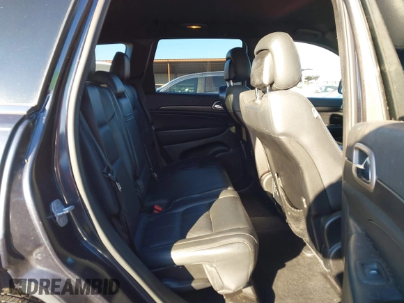 2014 Jeep Grand Cherokee Laredo with VIN 1C4RJEAG3EC218128, listed as a IAAI auction lot 40951611 with 119,596 mi miles and . Bid and sale history available at DreamBid. Image 8.