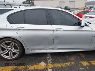 2013 BMW 5 Series 550i with VIN WBAFR9C57DDX80666, listed as a IAAI auction lot 41556020 with 137,418 mi miles and . Bid and sale history available at carsss.com. Image 19.
