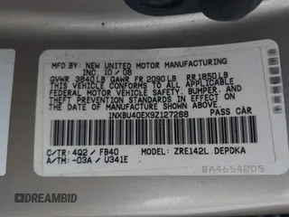 2009 Toyota Corolla with VIN 1NXBU40EX9Z127288, listed as a IAAI auction lot 42204718 with 140,000 mi miles and . Bid and sale history available at DreamBid. Image 9.