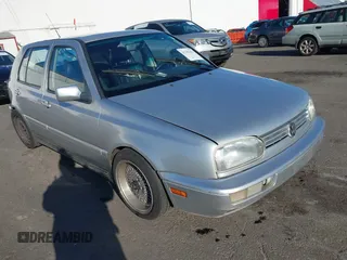 1999 Volkswagen Golf z VIN 3VWJA81HXXM215507, wystawiony jako IAAI lot #41391464 z przebiegiem 167 875 mil mil oraz . Historia ofert i sprzedaży dostępna na DreamBid. Obrazek 1.