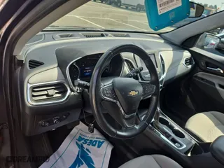 2020 Chevrolet Equinox LT with VIN 2GNAXJEV5L6230842, listed as a IAAI auction lot 42105973 with 46,112 mi miles. Bid and sale history available at carsss.com. Image 1.