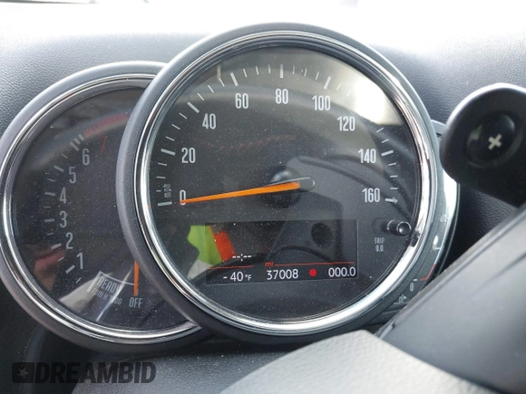 2020 MINI Countryman Cooper S z VIN WMZYX1C06L3M01166, wystawiony jako IAAI lot #41540885 z przebiegiem 37 008 mil mil oraz . Historia ofert i sprzedaży dostępna na DreamBid. Obrazek 7.