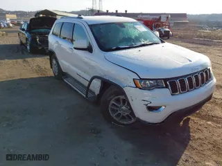 2018 Jeep Grand Cherokee Laredo E with VIN 1C4RJFAG0JC298441, listed as a IAAI auction lot 41748555 with 144,606 mi miles. Bid and sale history available at carsss.com. Image 1.