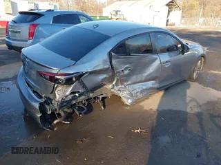 2014 Mazda 3 S Grand Touring with VIN JM1BM1W38E1184450, listed as a IAAI auction lot 40954511 with 157,036 mi miles and . Bid and sale history available at DreamBid. Image 4.