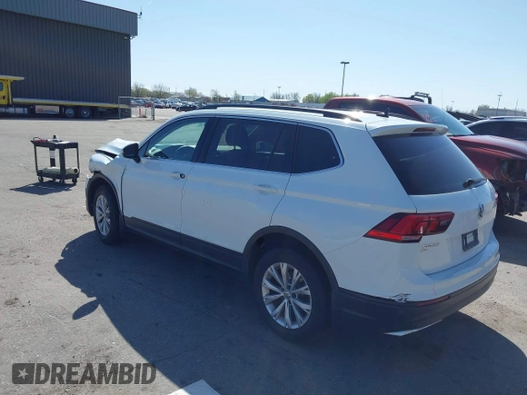 2019 Volkswagen Tiguan SE with VIN 3VV2B7AX8KM193166, listed as a IAAI auction lot 41957720 with 61,981 mi miles and . Bid and sale history available at DreamBid. Image 3.