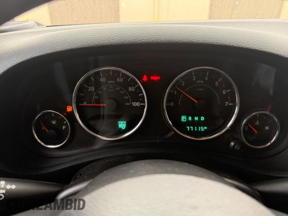 2015 Jeep Wrangler Sport with VIN 1C4AJWAG0FL750098, listed as a IAAI auction lot 41266454 with 77,115 mi miles. Bid and sale history available at carsss.com. Image 7.