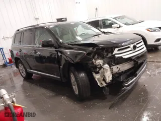 2012 Toyota Highlander with VIN 5TDBK3EH2CS163379, listed as a IAAI auction lot 41807409 with 202,554 mi miles. Bid and sale history available at carsss.com. Image 1.