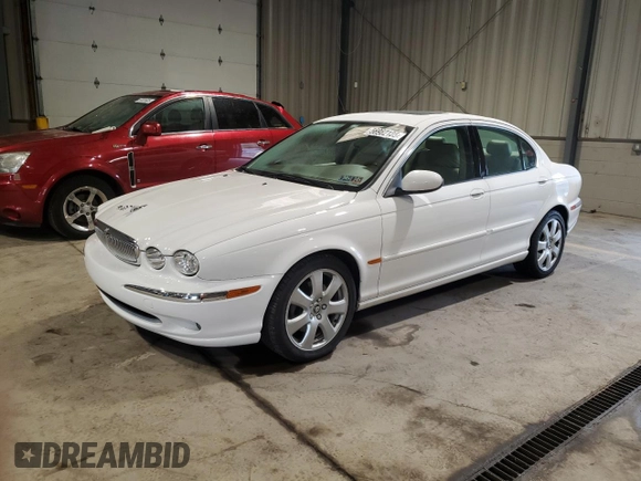 2004 Jaguar X-Type with VIN SAJEA51C34WE06046, listed as a Copart auction lot 56982105 with 69,265 mi miles and Clean Title. Bid and sale history available at DreamBid. Image 1.