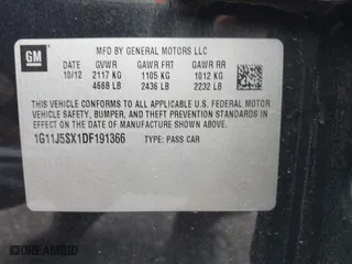 2013 Chevrolet Malibu LTZ with VIN 1G11J5SX1DF191366, listed as a IAAI auction lot 40121794 with 111,036 mi miles. Bid and sale history available at carsss.com. Image 9.