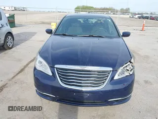 2014 Chrysler 200 Touring with VIN 1C3CCBBB2EN128771, listed as a IAAI auction lot 42148625 with 77,848 mi miles and . Bid and sale history available at DreamBid. Image 6.