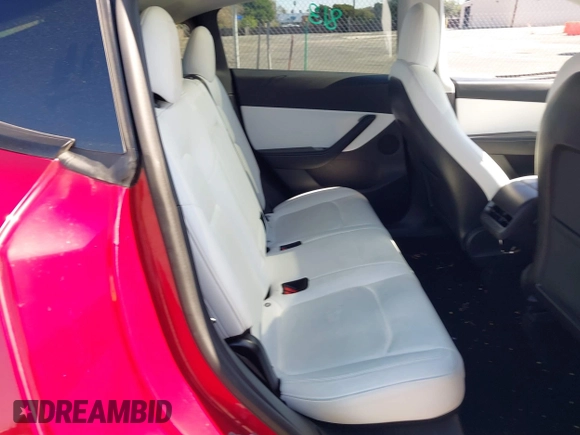2021 Tesla Model Y Performance with VIN 5YJYGDEF4MF092062, listed as a IAAI auction lot 41583793 with 57,194 mi miles and . Bid and sale history available at DreamBid. Image 8.