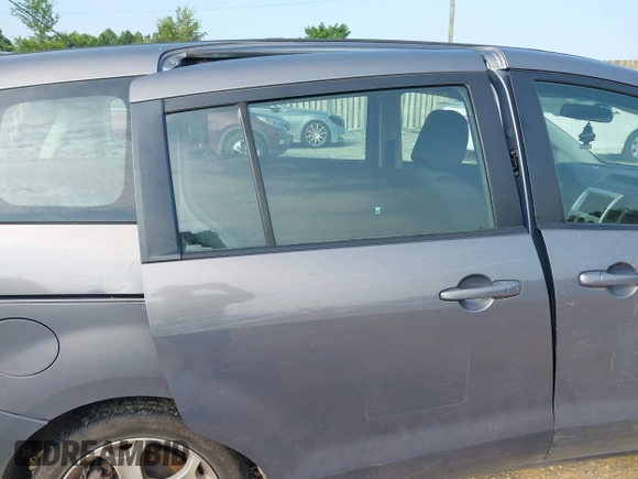 2010 Mazda 5 Sport z VIN JM1CR2W37A0365602, wystawiony jako IAAI lot #42816134 z przebiegiem 154 620 mil mil oraz . Historia ofert i sprzedaży dostępna na DreamBid. Obrazek 6.