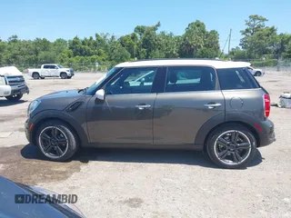 2012 MINI Countryman S z VIN WMWZC3C55CWL83472, wystawiony jako IAAI lot #42289981 z przebiegiem 101 812 mil mil oraz . Historia ofert i sprzedaży dostępna na DreamBid. Obrazek 14.