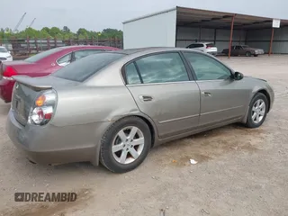 2002 Nissan Altima SL z VIN 1N4AL11D42C286462, wystawiony jako IAAI lot #42442458 z przebiegiem 142 053 mil mil oraz . Historia ofert i sprzedaży dostępna na DreamBid. Obrazek 4.