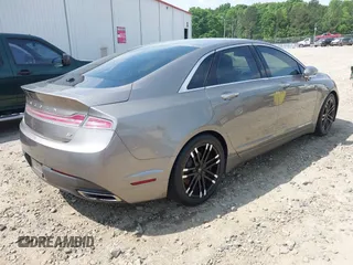 2015 Lincoln MKZ with VIN 3LN6L2GK9FR616272, listed as a IAAI auction lot 42142551 with Not Provided miles and . Bid and sale history available at DreamBid. Image 4.
