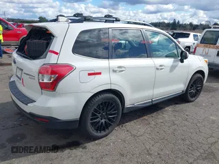 2016 Subaru Forester 2.5i Touring with VIN JF2SJAXC3GH511355, listed as a IAAI auction lot 41818639 with 1 mi miles. Bid and sale history available at carsss.com. Image 4.