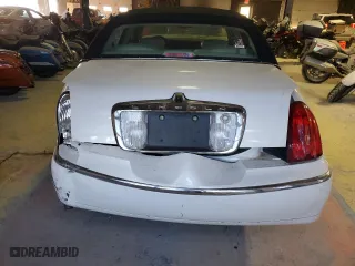 2002 Lincoln Town Car Cartier with VIN 1LNHM83W22Y662670, listed as a Copart auction lot 83526144 with 75,072 mi miles and Salvage Title. Bid and sale history available at carsss.com. Image 6.
