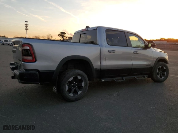 2019 Ram 1500 Rebel with VIN 1C6SRFLT2KN698535, listed as a Copart auction lot 81854214 with 61,586 mi miles and Clean Title. Bid and sale history available at carsss.com. Image 3.