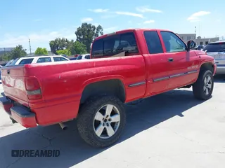 2001 Dodge 1500 z VIN 3B7HF13Z11G223100, wystawiony jako IAAI lot #42350126 z przebiegiem 225 560 mil mil oraz . Historia ofert i sprzedaży dostępna na DreamBid. Obrazek 4.