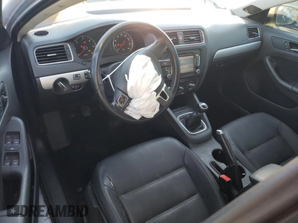 2012 Volkswagen Jetta Sedan TDI with VIN 3VW3L7AJ0CM089765, listed as a Copart auction lot 82358034 with 144,648 mi miles and Salvage Title. Bid and sale history available at carsss.com. Image 8.