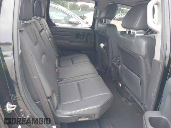 2013 Honda Ridgeline RTL with VIN 5FPYK1F56DB003473, listed as a IAAI auction lot 42101963 with 170,375 mi miles and . Bid and sale history available at DreamBid. Image 8.