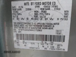 2006 Ford Escape XLT with VIN 1FMYU03Z66KC72563, listed as a IAAI auction lot 41204974 with 249,149 mi miles. Bid and sale history available at carsss.com. Image 9.