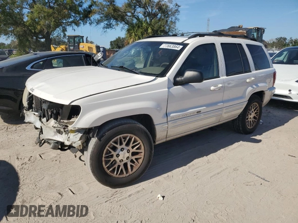 2002 Jeep Grand Cherokee Limited with VIN 1J4GX58S32C320843, listed as a Copart auction lot 77663864 with 289,537 mi miles and Salvage Title. Bid and sale history available at DreamBid. Image 1.
