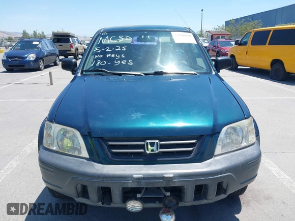 1998 Honda CR-V LX z VIN JHLRD1843WC083751, wystawiony jako IAAI lot #42356438 z przebiegiem 167 342 mil mil oraz . Historia ofert i sprzedaży dostępna na DreamBid. Obrazek 12.