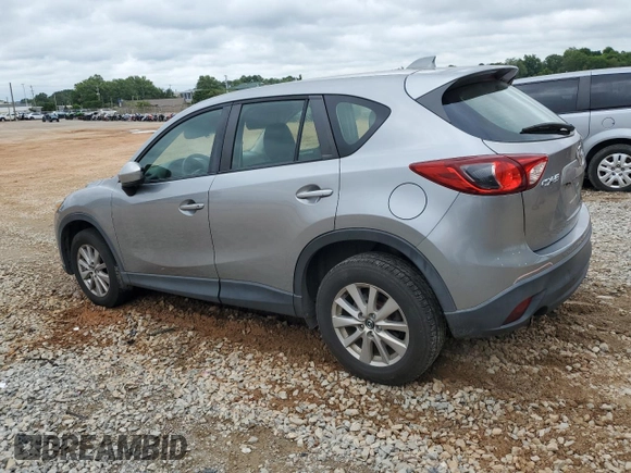2015 Mazda CX-5 Sport z VIN JM3KE2BE4F0459532, wystawiony jako Copart lot #61049235 z przebiegiem 149 808 mil mil oraz Szkoda całkowita • Salvage title. Historia ofert i sprzedaży dostępna na DreamBid. Obrazek 2.