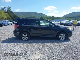 2014 Subaru Forester 2.5i Limited with VIN JF2SJAJC9EH517196, listed as a IAAI auction lot 31343919 with 71,396 mi miles. Bid and sale history available at carsss.com. Image 13.