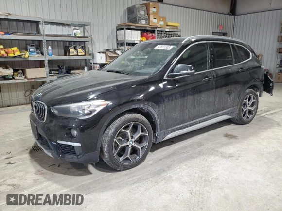 2018 BMW X1 xDrive28i with VIN WBXHT3C37J5L30341, listed as a Copart auction lot 42691505 with 84,523 mi miles and Salvage Title. Bid and sale history available at carsss.com. Image 1.