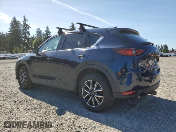 2018 Mazda CX-5 Grand Touring z VIN JM3KFBDM5J0379246, wystawiony jako Copart lot #58587865 z przebiegiem 46 339 mil mil oraz Szkody całkowita. Historia ofert i sprzedaży dostępna na DreamBid. Obrazek 2.