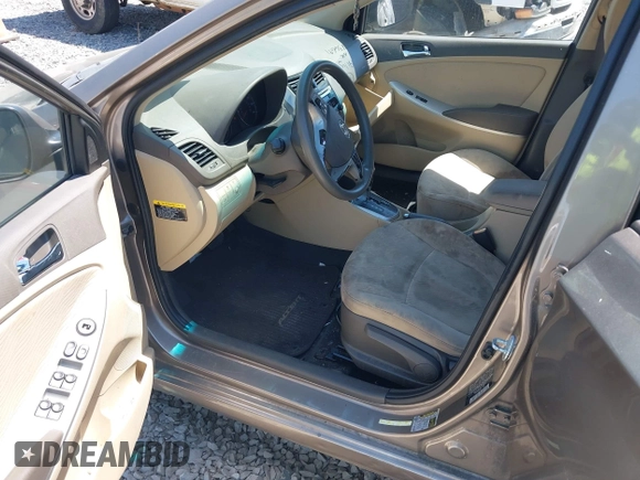 2014 Hyundai Accent GLS with VIN KMHCU4AE7EU736691, listed as a IAAI auction lot 42054514 with 80,715 mi miles and . Bid and sale history available at carsss.com. Image 5.