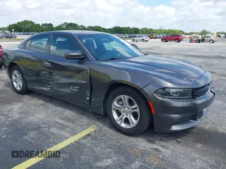 2022 Dodge Charger SXT with VIN 2C3CDXBG4NH248389, listed as a IAAI auction lot 42144728 with 54,132 mi miles and . Bid and sale history available at carsss.com. Image 1.
