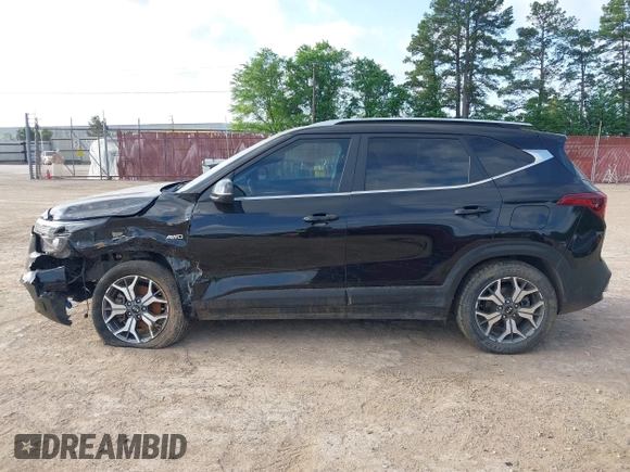 2021 Kia Seltos EX with VIN KNDERCAAXM7228380, listed as a IAAI auction lot 42015912 with 61,612 mi miles. Bid and sale history available at carsss.com. Image 15.
