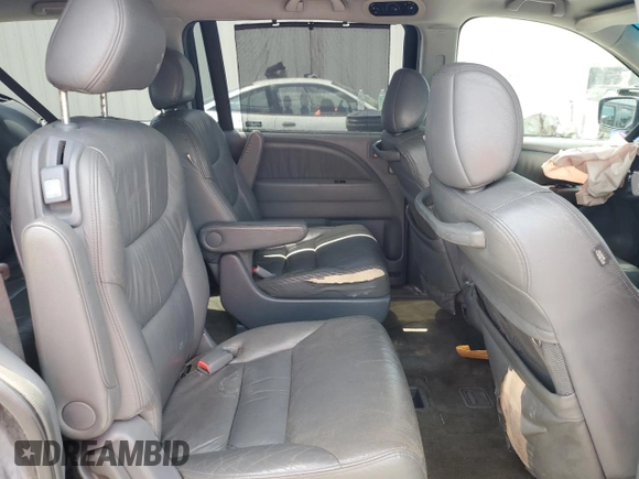 2005 Honda Odyssey EX-L z VIN 5FNRL38775B014777, wystawiony jako Copart lot #56245735 z przebiegiem 222 798 mil mil oraz Szkoda całkowita • Salvage title. Historia ofert i sprzedaży dostępna na DreamBid. Obrazek 11.