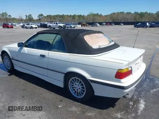 1996 BMW 3-Series 328IC with VIN WBABK8324TET92418, listed as a IAAI auction lot 41815664 with 128,661 mi miles. Bid and sale history available at carsss.com. Image 3.
