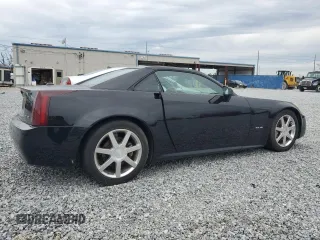2005 Cadillac XLR z VIN 1G6YV34A855601131, wystawiony jako Copart lot #88100685 z przebiegiem 108 720 mil mil oraz Szkody całkowita. Historia ofert i sprzedaży dostępna na DreamBid. Obrazek 3.