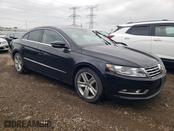 2015 Volkswagen CC R-Line with VIN WVWBP7AN1FE801216, listed as a Copart auction lot 67733404 with 48,394 mi miles and Salvage Title. Bid and sale history available at carsss.com. Image 4.