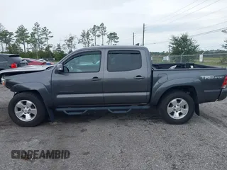 2014 Toyota Tacoma with VIN 5TFLU4EN9EX099414, listed as a IAAI auction lot 40528514 with 122,827 mi miles. Bid and sale history available at carsss.com. Image 13.