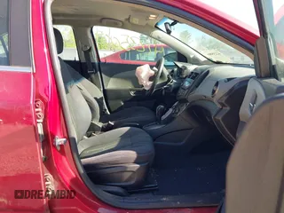 2013 Chevrolet Sonic LT with VIN 1G1JC5SH3D4256507, listed as a IAAI auction lot 42235009 with 117,804 mi miles and . Bid and sale history available at DreamBid. Image 5.